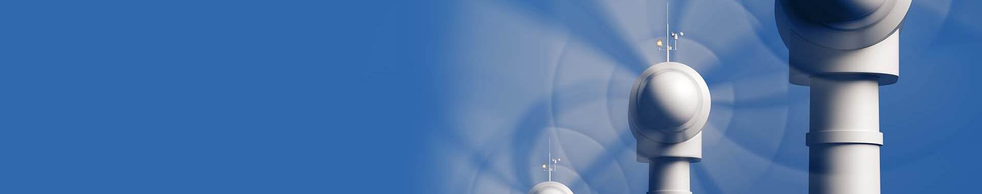 Close up of whirling wind farm blades