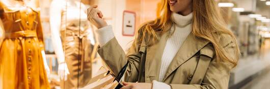 Woman walks through the mall.